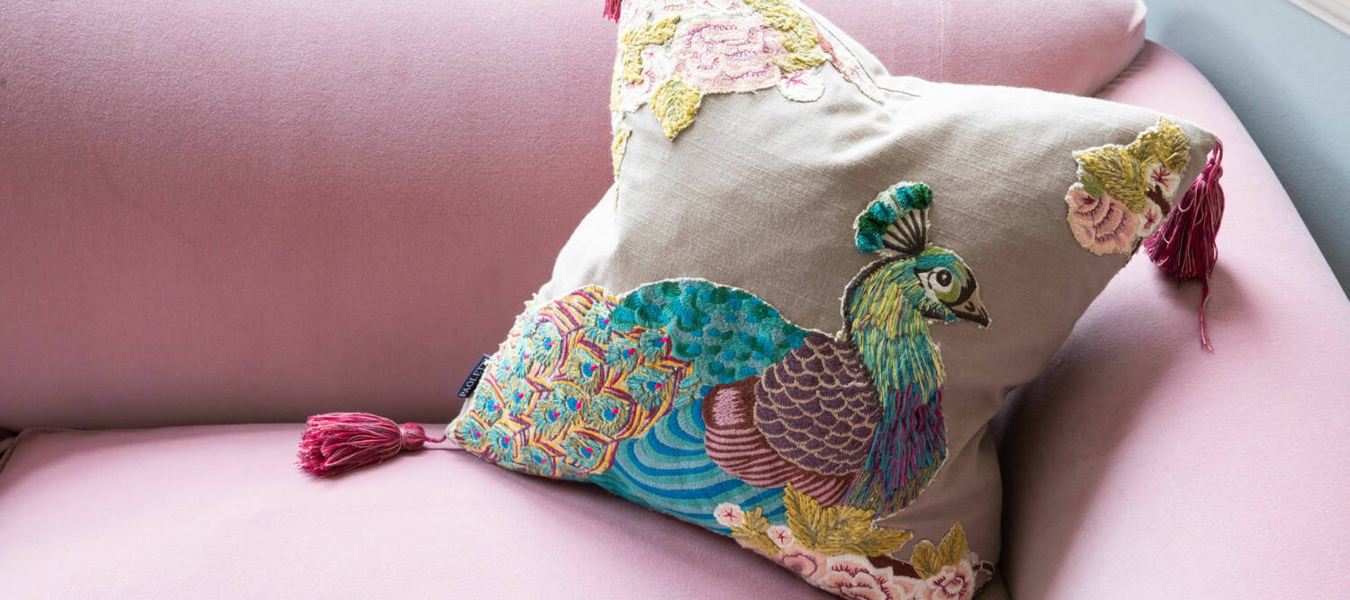 Arts Pink Sofa & Peacock Cushion