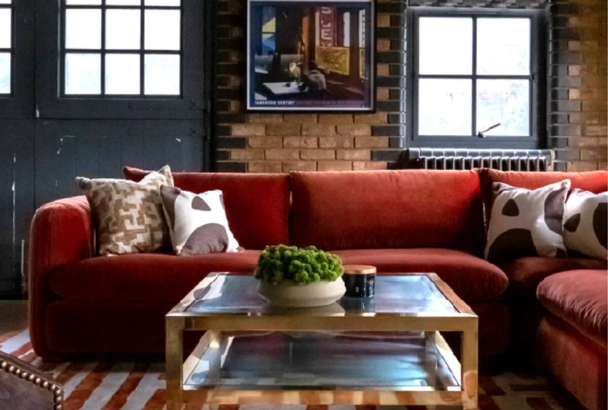 rust sofa in industrial style lounge