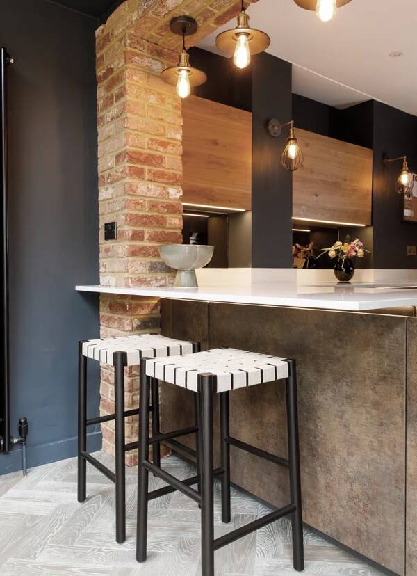bar stools at indsutrial style kitchen counter