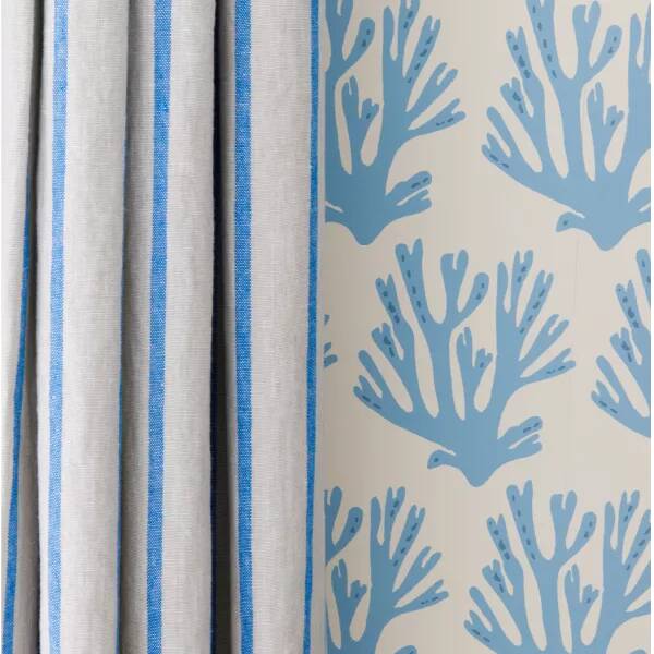 Blue room curtains and pattern wallpaper